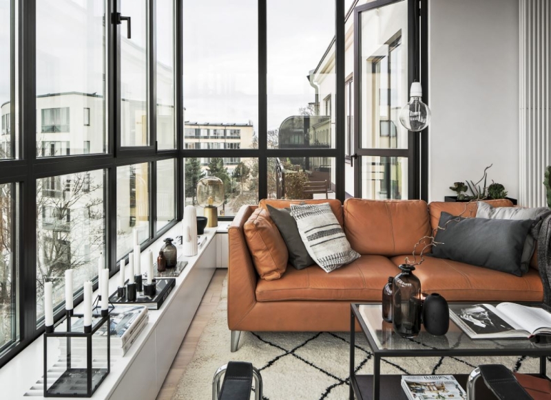 Кожаный диван в интерьере: правила выбора